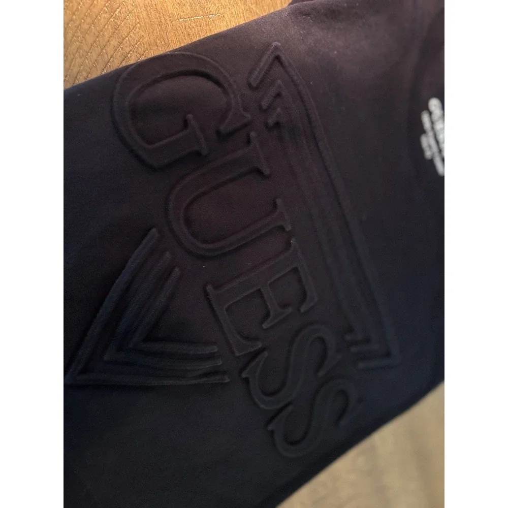 GUESS Men's L Black Solid Logo Crew Neck Short Sleeve Cotton Knit T-Shirt - Picture 1 of 5